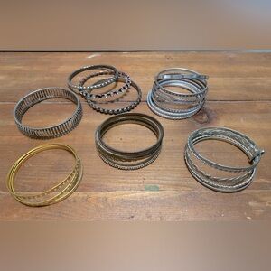 Lot of bangle bracelets, great for costume!